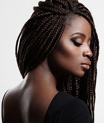 African American woman in dreadlocks with smooth skin